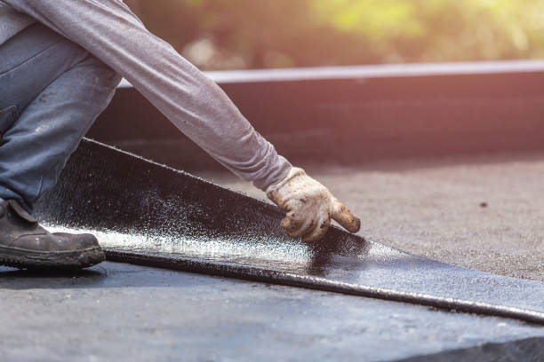 Professional Exterior Waterproofing technician working in Tipp City, OH